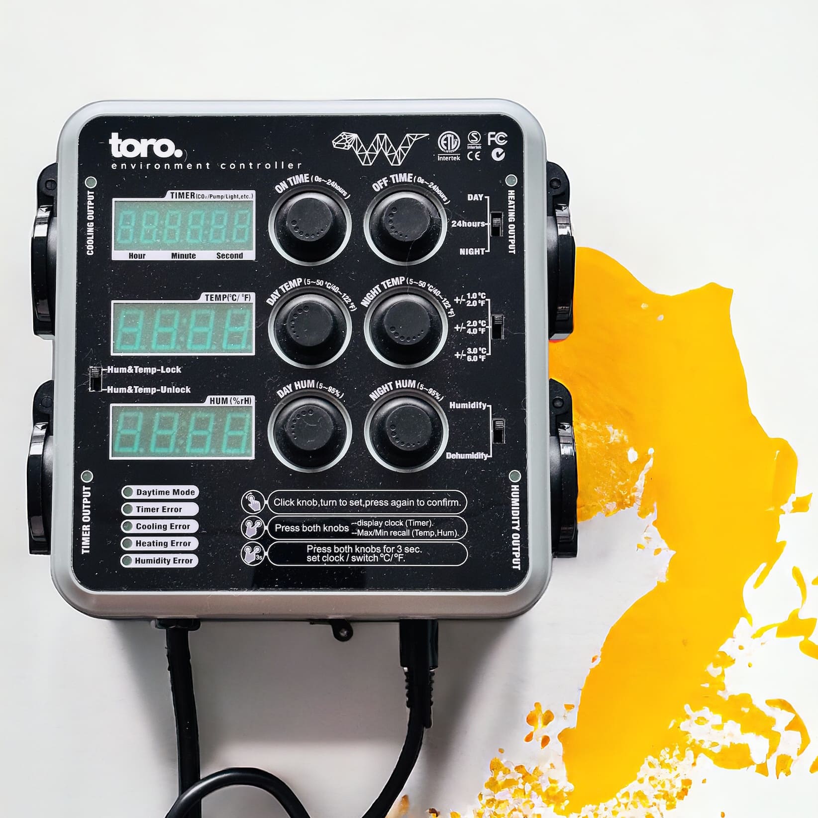 The product is displayed on white surface with a yellow color splash in the background. TORO Climate Control controls heating, cooling, humidity, and timed devices with its four 240V receptacles. Need to trigger lighting or operate pumps? The timer outlet has got you covered.